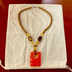 This beautiful wooden beads, amber pendant & crystal glass, tiger’s beadswood